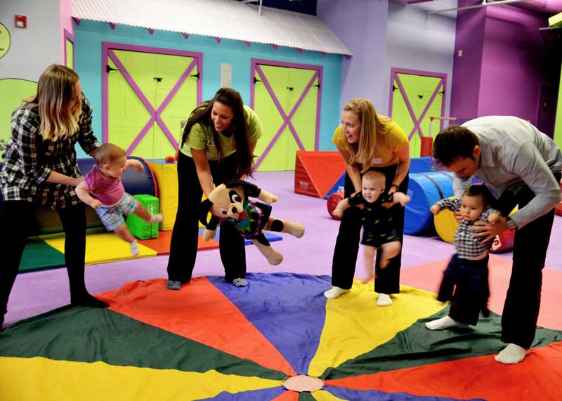 Moms and babies both enjoy Romp n' Roll Willow Grove's movement classes.