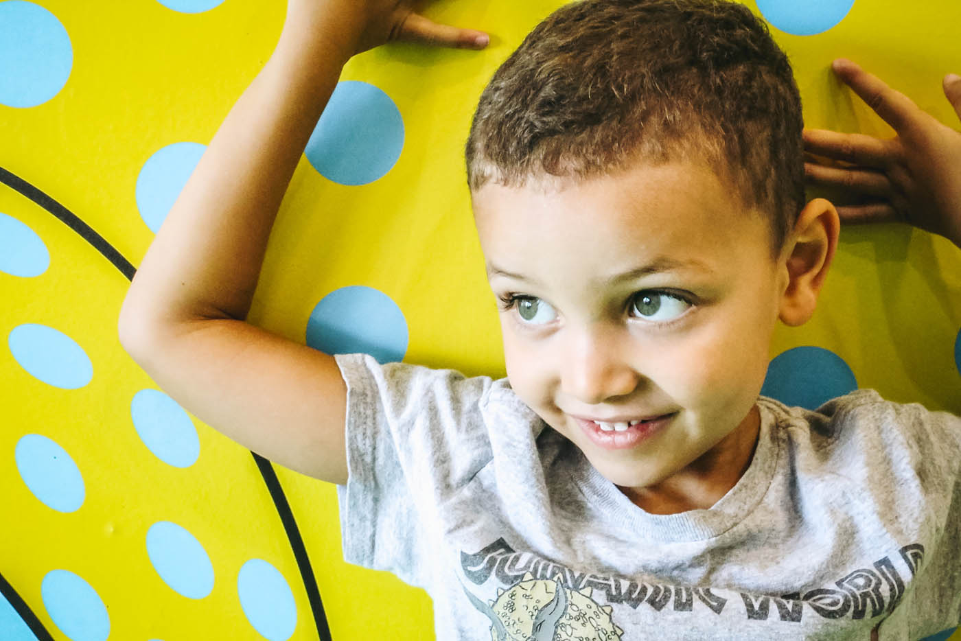 A boy playing in the gym at Romp n' Roll.