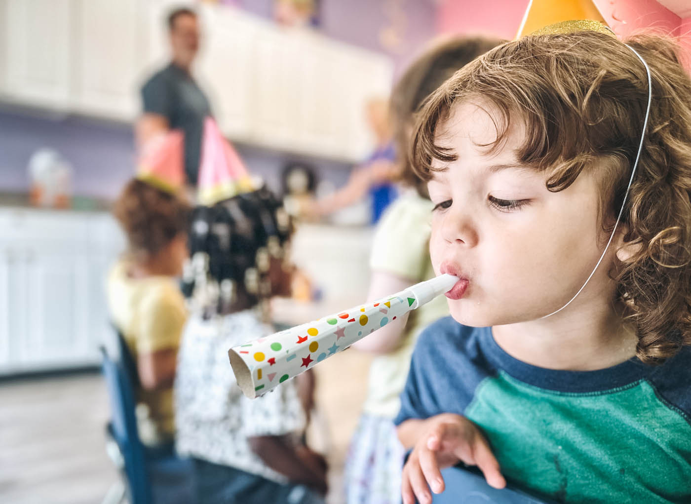 A kid at Romp n' Roll enjoying his birthday party - learn how we can help your kid (and you) enjoy their birthday to the fullest!